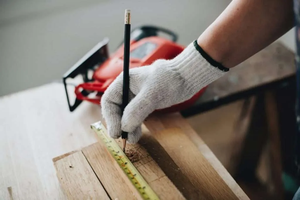 measuring wood floorboards
