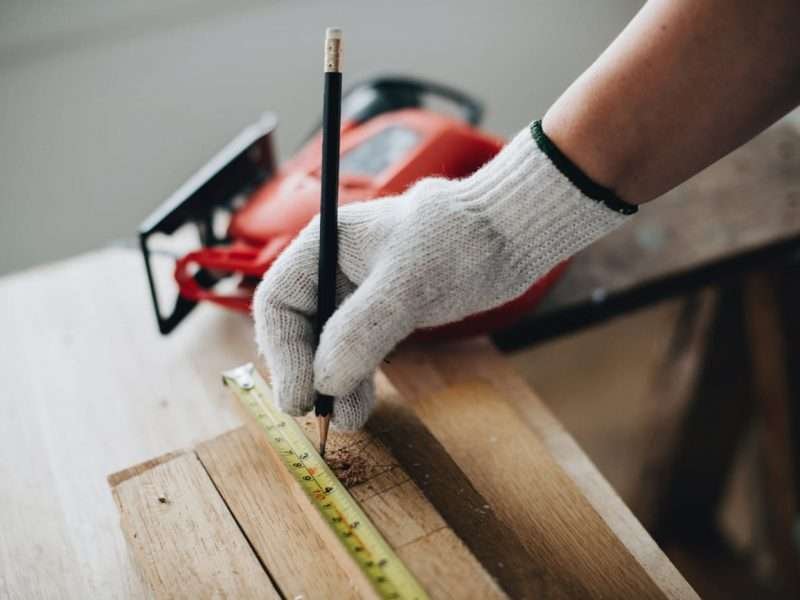 measuring wood floorboards