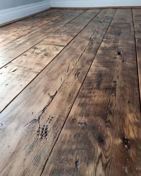 Reclaimed Floorboards In A Small Room