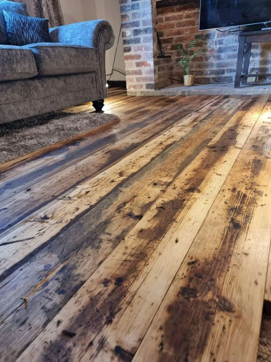 sofa on rustic floorboards